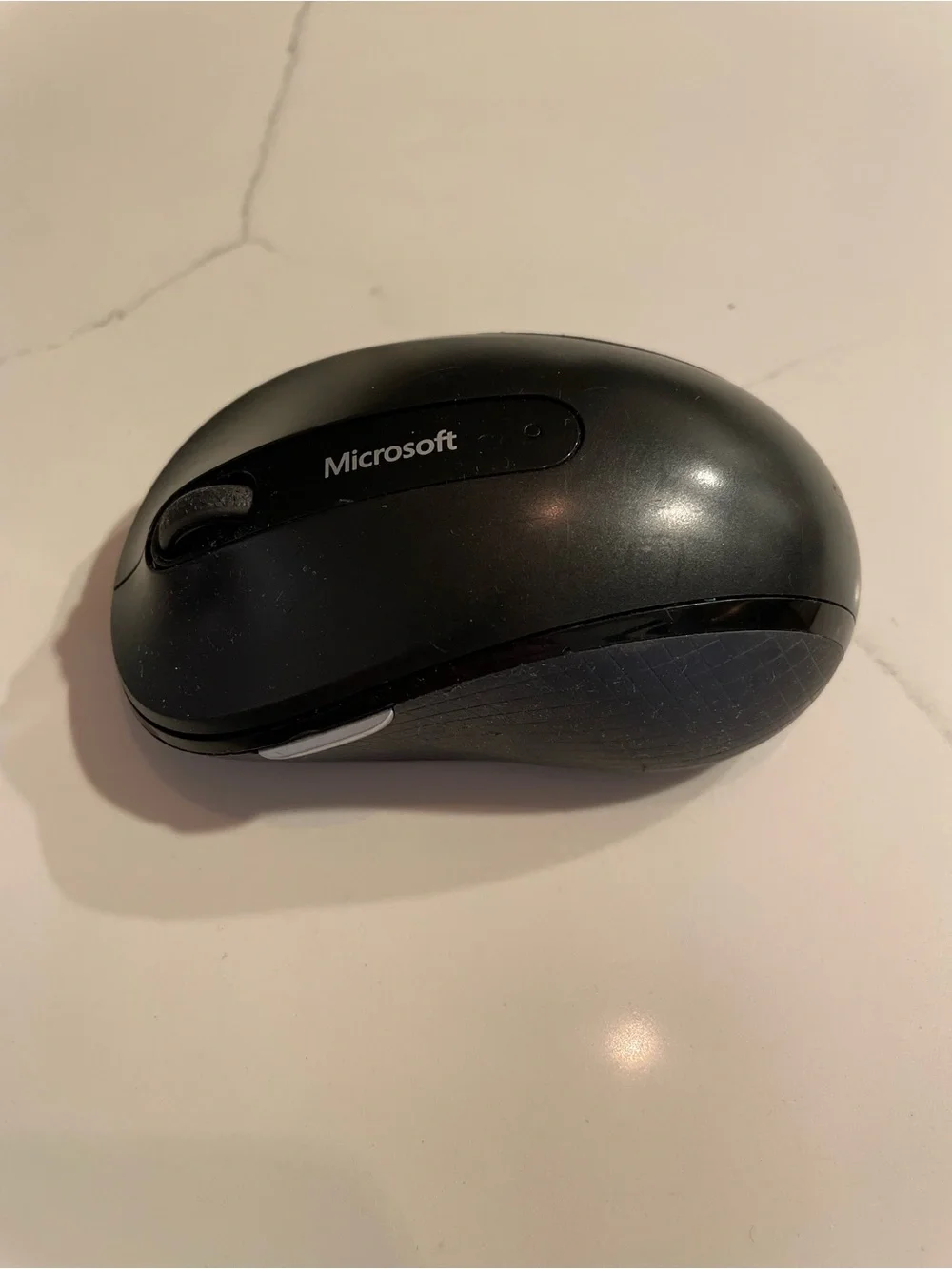 Microsoft Black Wireless Mouse with Green Indicator Light